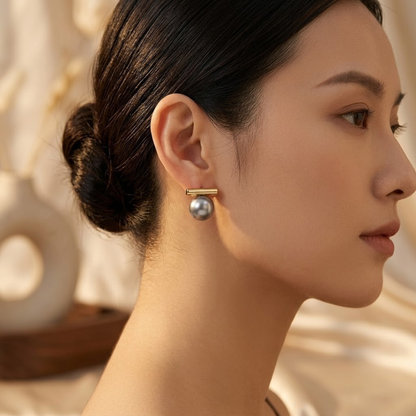 Kultaiset tankonappikorvakorut helmellä
