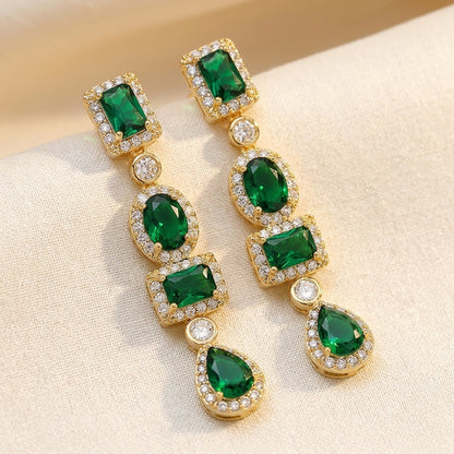 Aretes Colgantes Multiforma de Oro con Esmeralda